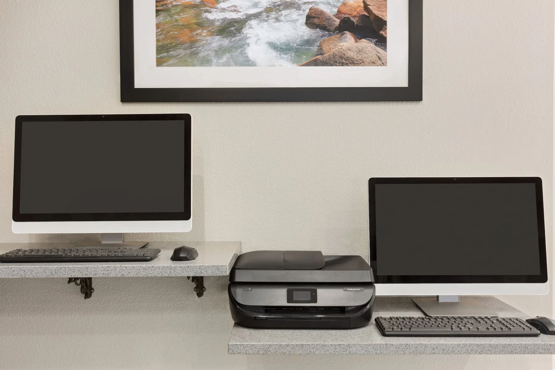 Hotel business center with computer and workspace